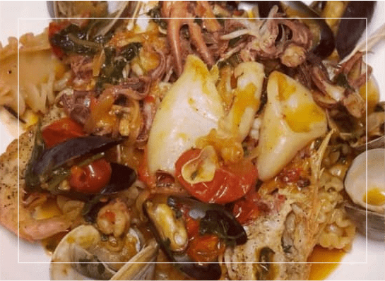 Seafood with quinoa pasta dish